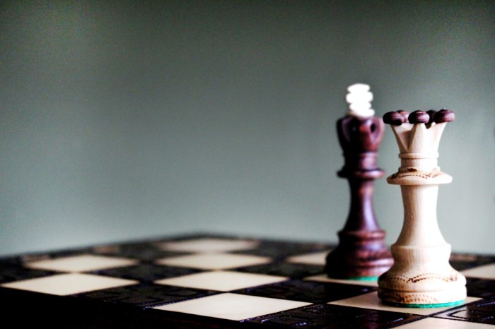 King and queen pieces on chess board. Liam Hennessy, Digital Strategist